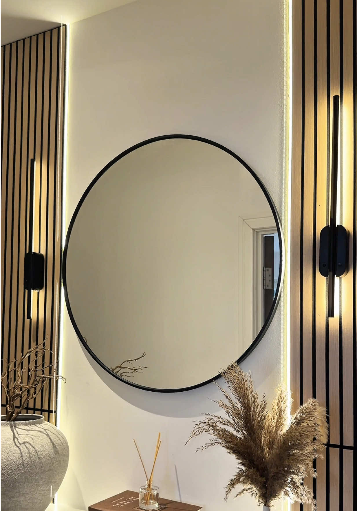 Sophiee showing a wall-panel home decor upgrade